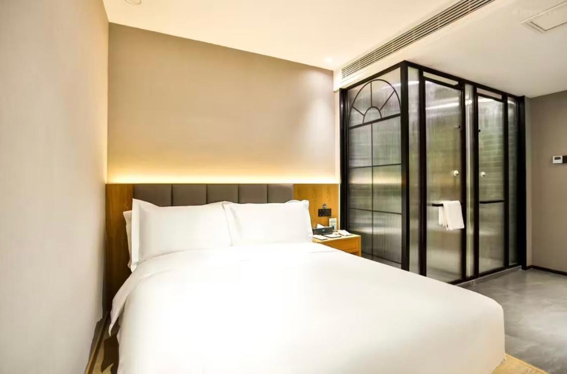 True Go Hotel - Shanghai Jing'An Temple Nanjing West Road Dış mekan fotoğraf